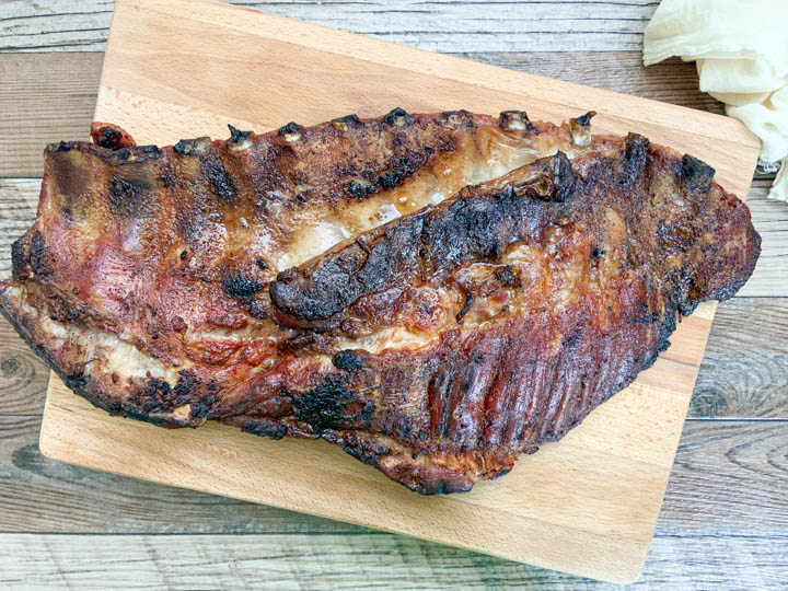 grilled pork spare ribs on cutting board
