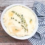 garlic mashed potatoes in white bowl