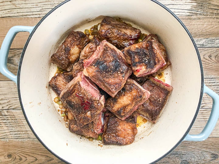seared beef short ribs in dutch oven