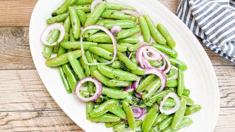 snap peas on white serving platter