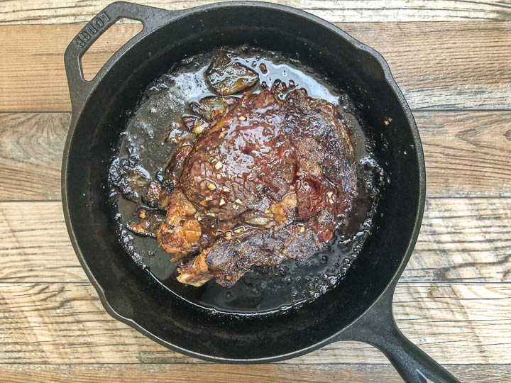 cooked prime rib in cast iron skillet 