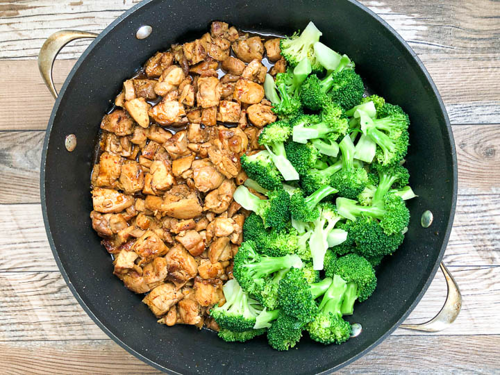 chicken and blanched broccoli in skillet