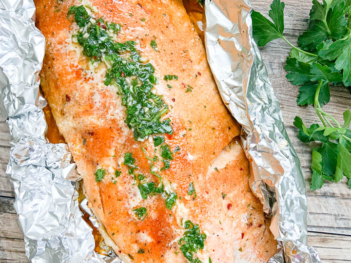 grilled salmon topped with chimichurri