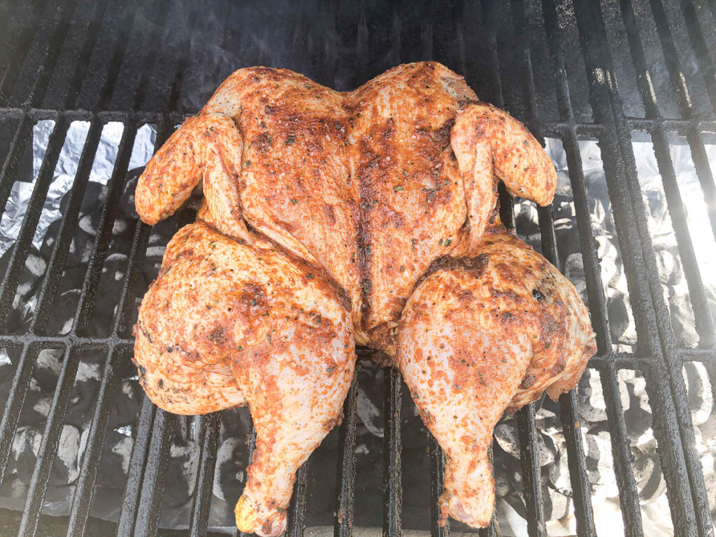 raw chicken placed on grill