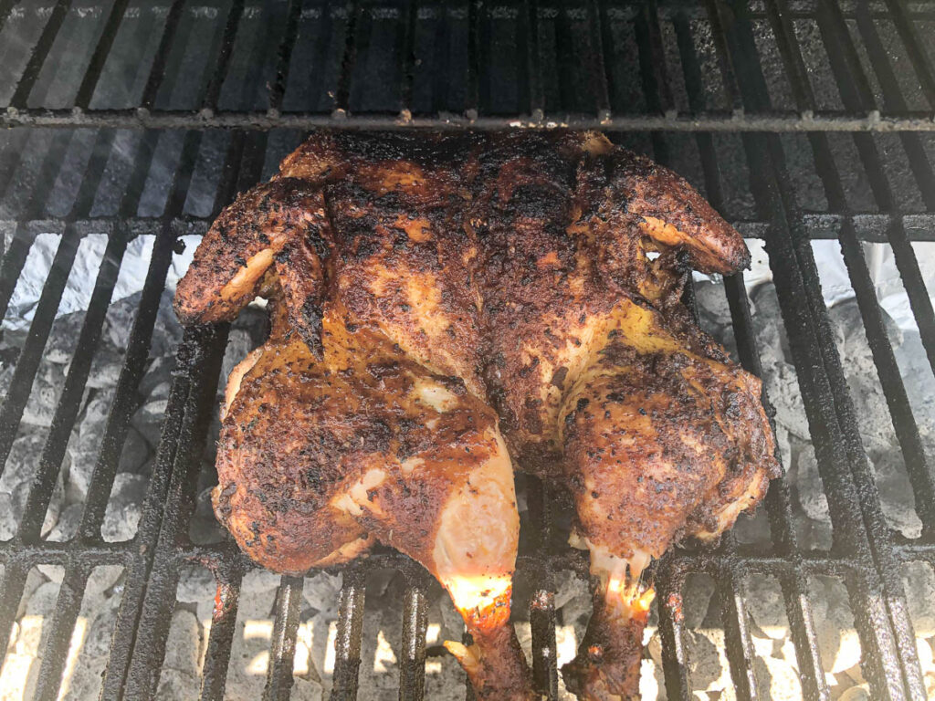 chicken ready to be removed from grill.
