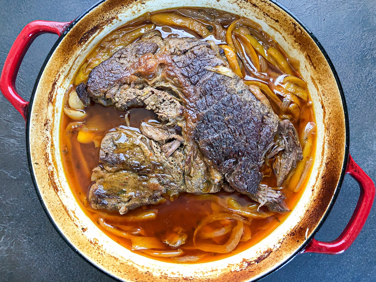 chuck roast in dutch oven after cooking.