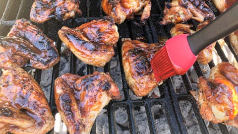 bbq chicken on charcoal grill