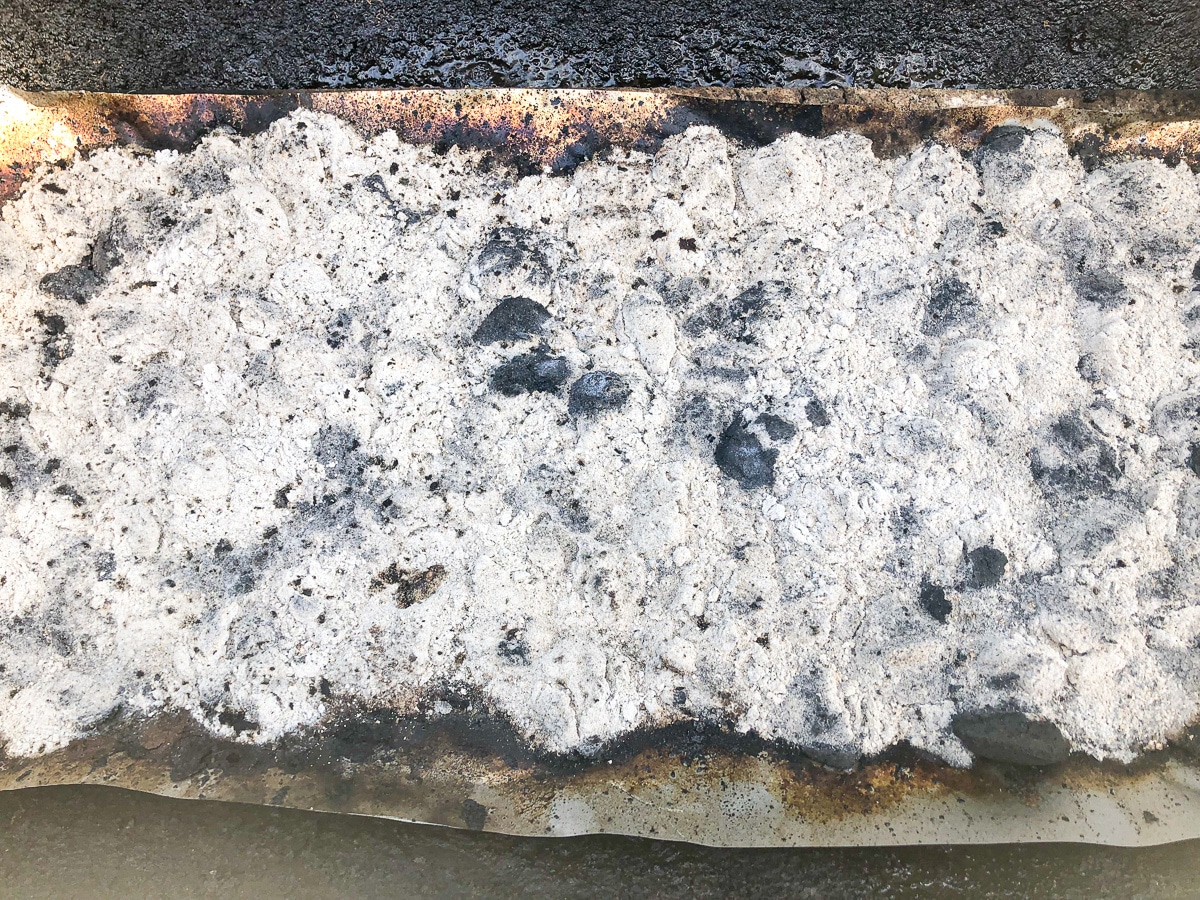 close up image of burned coals and ash.