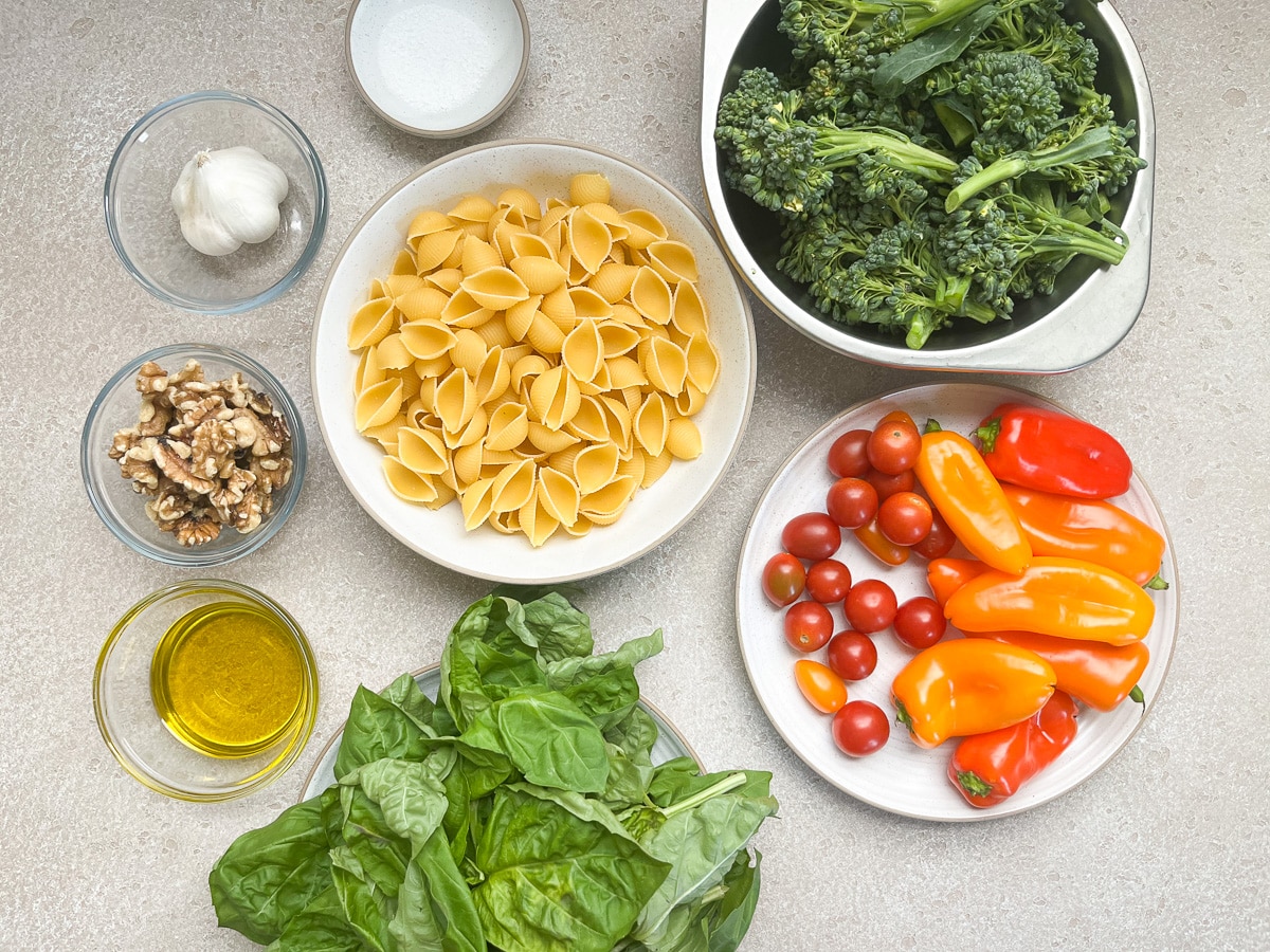ingredients to pesto pasta with veggies.