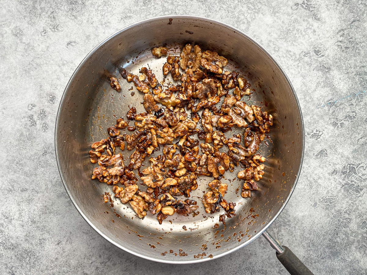 candied walnut in a skillet.