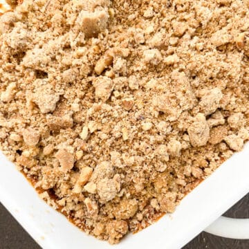 Frontal view of baked sweet potato casserole with crisp cinnamon walnut streusel.